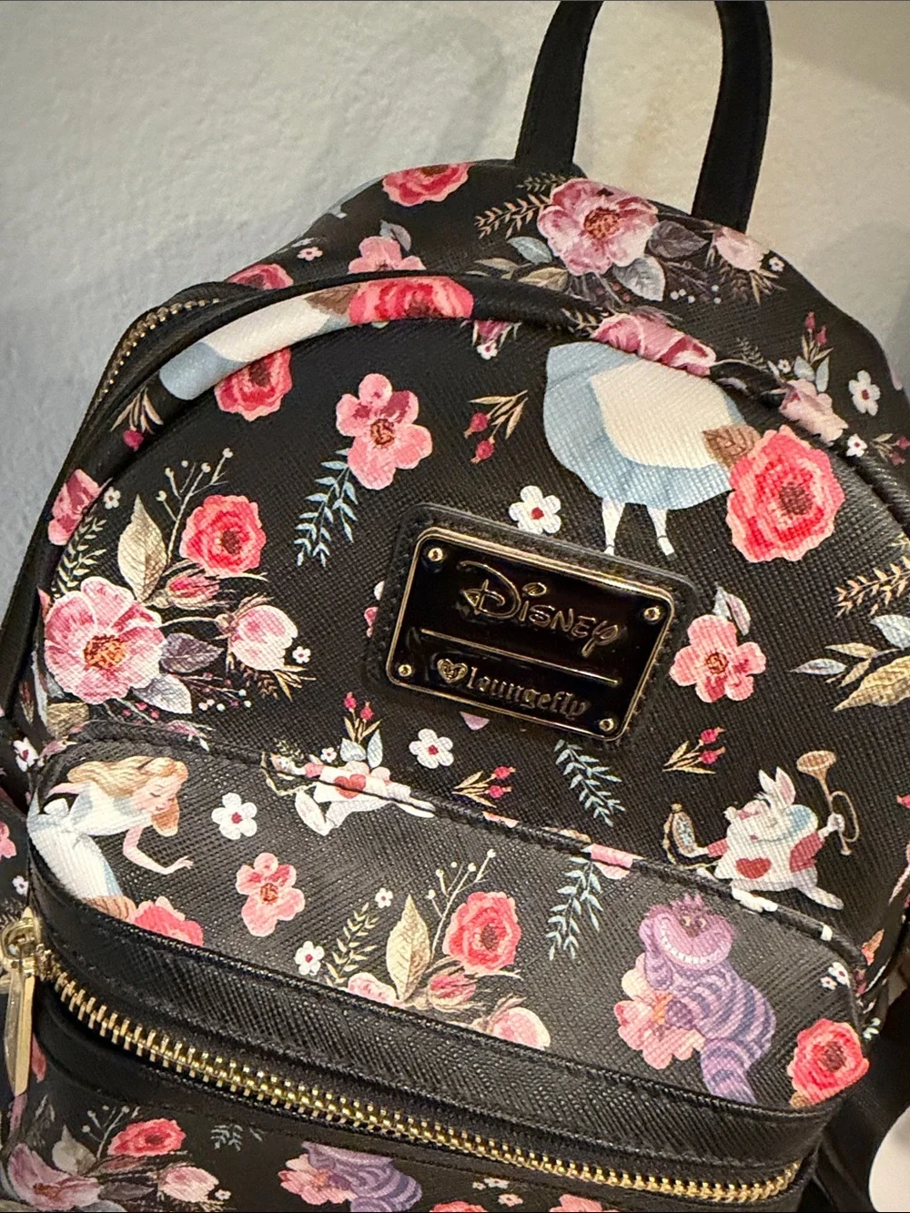 Loungefly Black Floral Disney Mini Alvin’s in Wonder Backpack with Gold Hardware